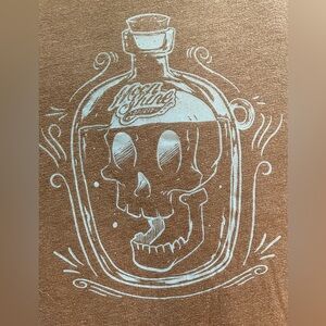 Moonshine Spirit by Brad Paisley Brown Skull Graphic Tee